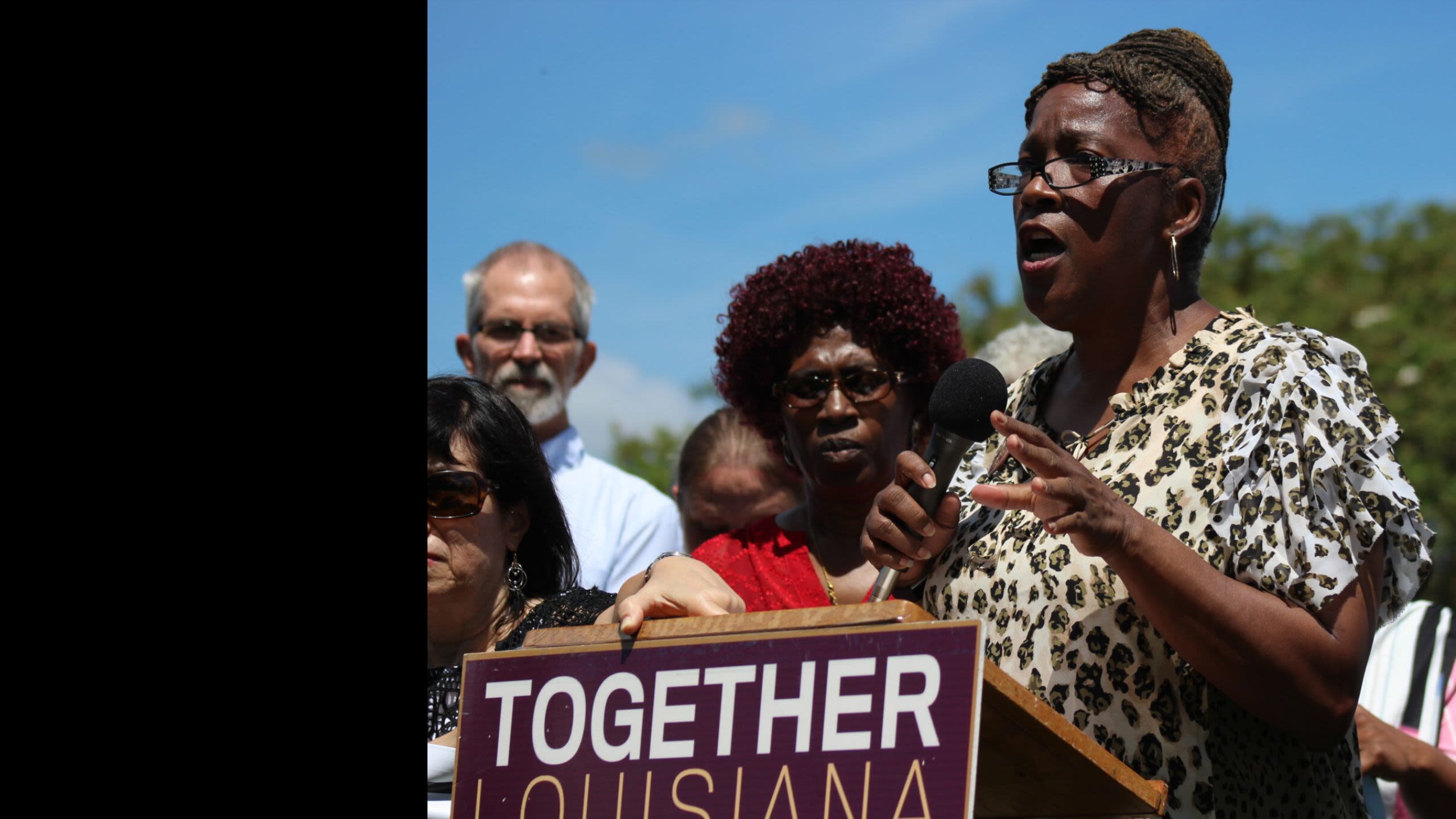 Ms. Wanda Manning campaigns outside the Louisiana State Capitol in Baton Rouge