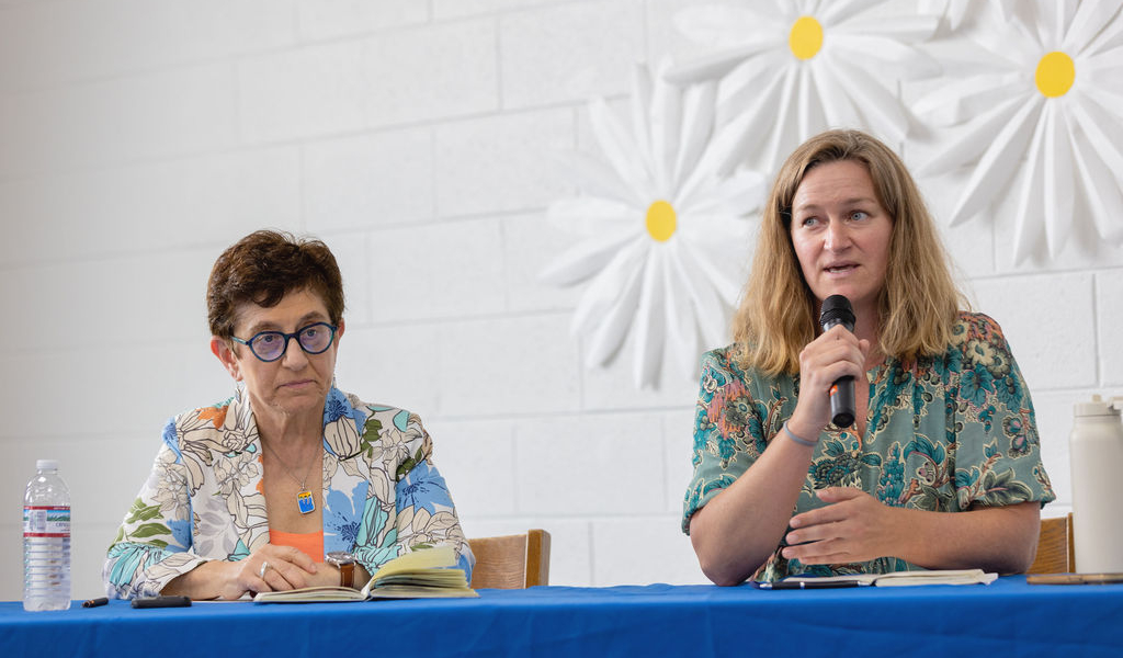 Erica Mesker and Gigi Sohn speaking on panel
